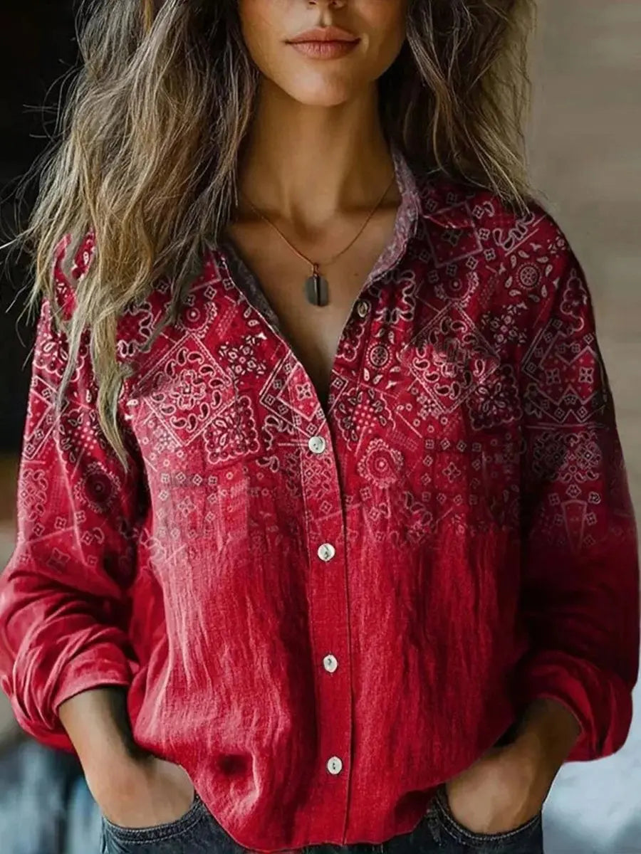 Women's boho long sleeve blouse with full button-up front, featuring a beautiful floral pattern.