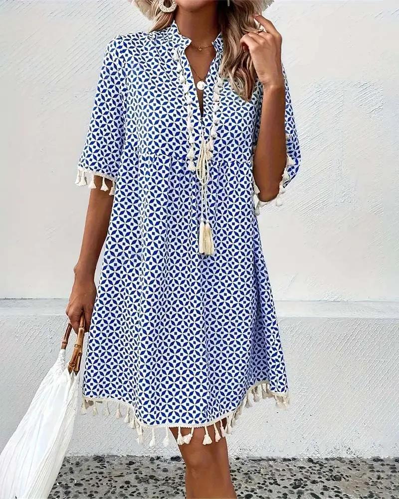 Casual women's boho mini tunic dress with a vibrant geometric print, comfortable for everyday summer wear.