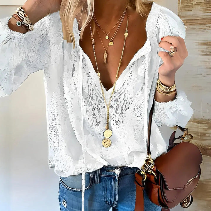 Elegant women's deep V-neck long sleeve lace top, versatile for casual or dressy bohemian outfits.