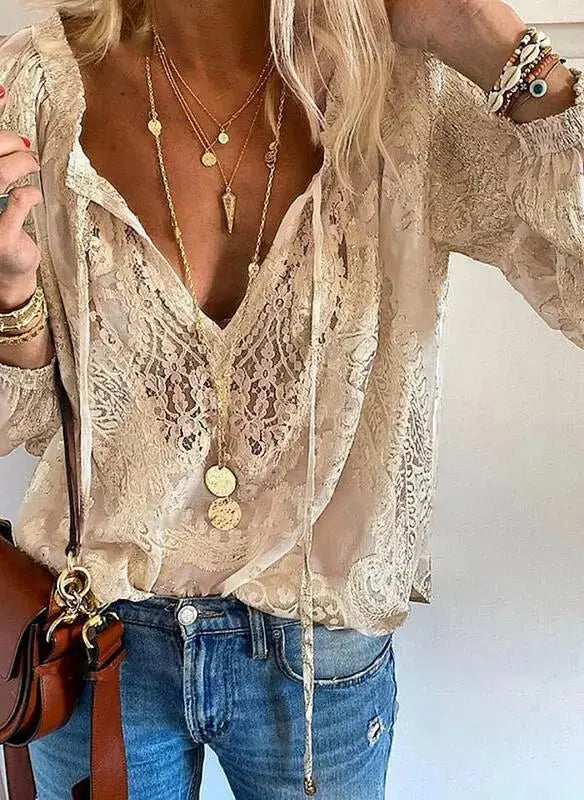 Stylish women's boho lace long sleeve top with deep V-neck, a chic and versatile bohemian fashion choice.