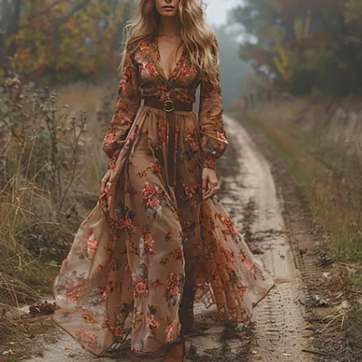 Bohemian floral print maxi dress for women, featuring long sleeves & tiered skirt. Ideal spring/summer fashion & casual wear.