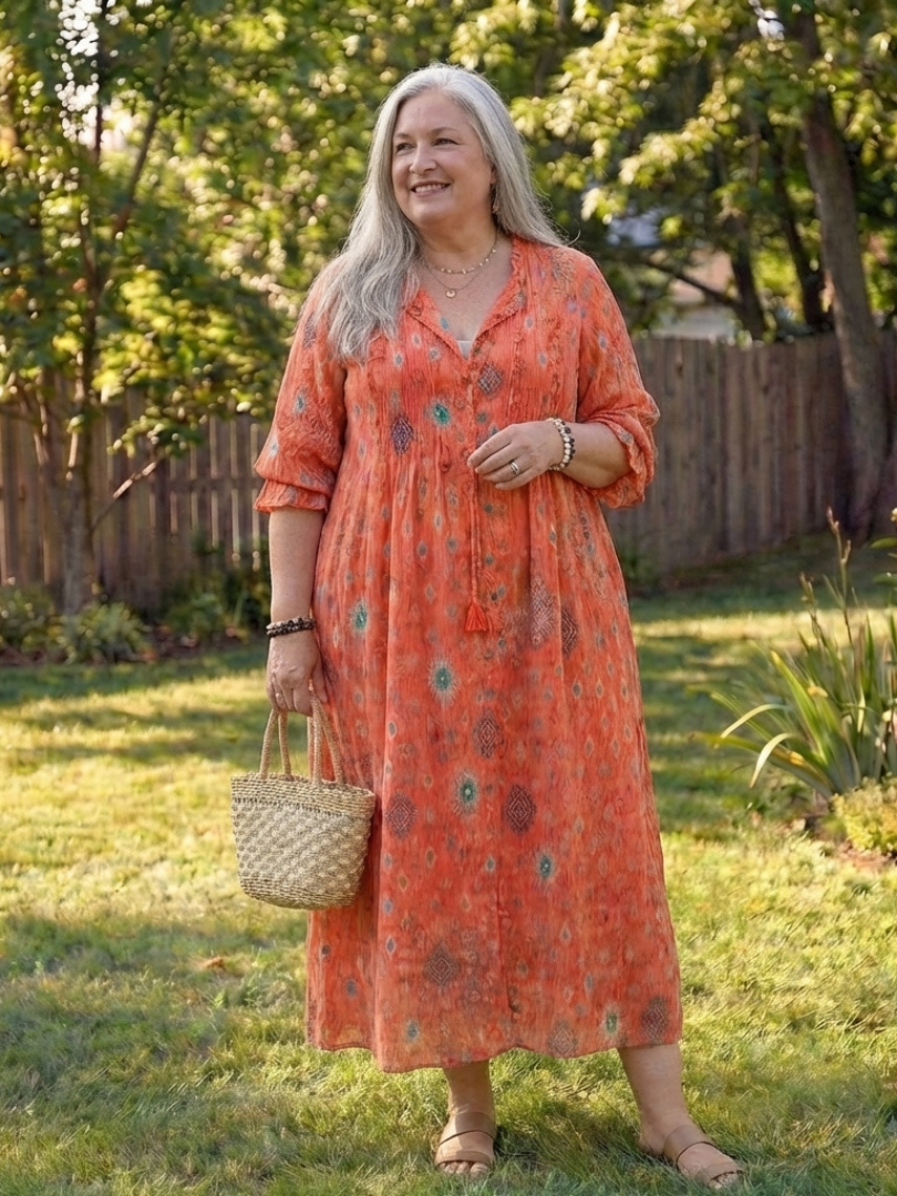 Casual women's day dress: button-front midi with an eye-catching floral print, ideal for bohemian fashion.