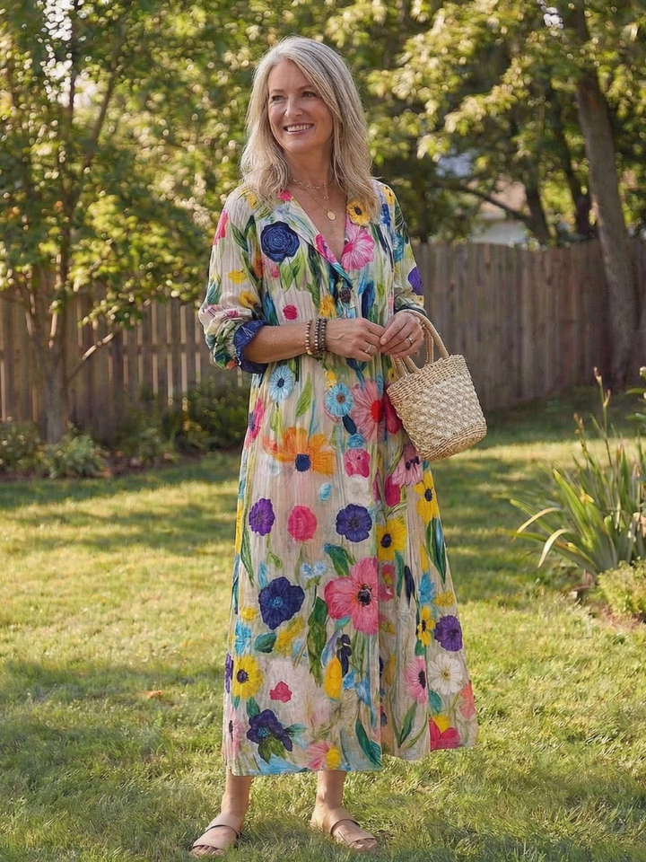 Women's summer boho midi dress with an all-over floral pattern and charming button-front design.