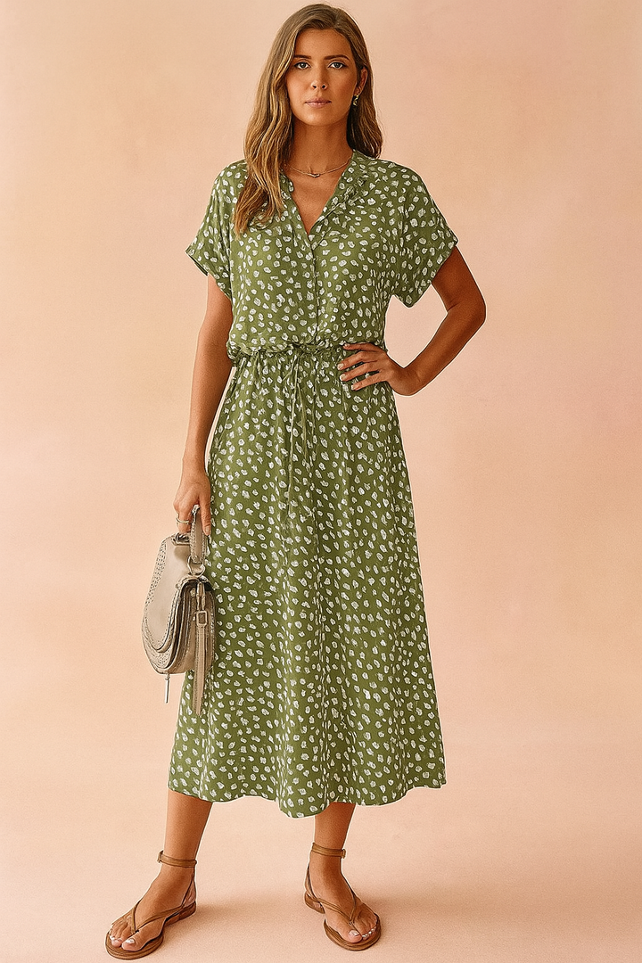 Elegant women's midi dress, boho style with polka dots, versatile for events or casual summer wear.