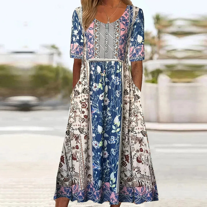 Festival-style boho print midi dress, sleeveless, shirred bodice, tiered, for women.