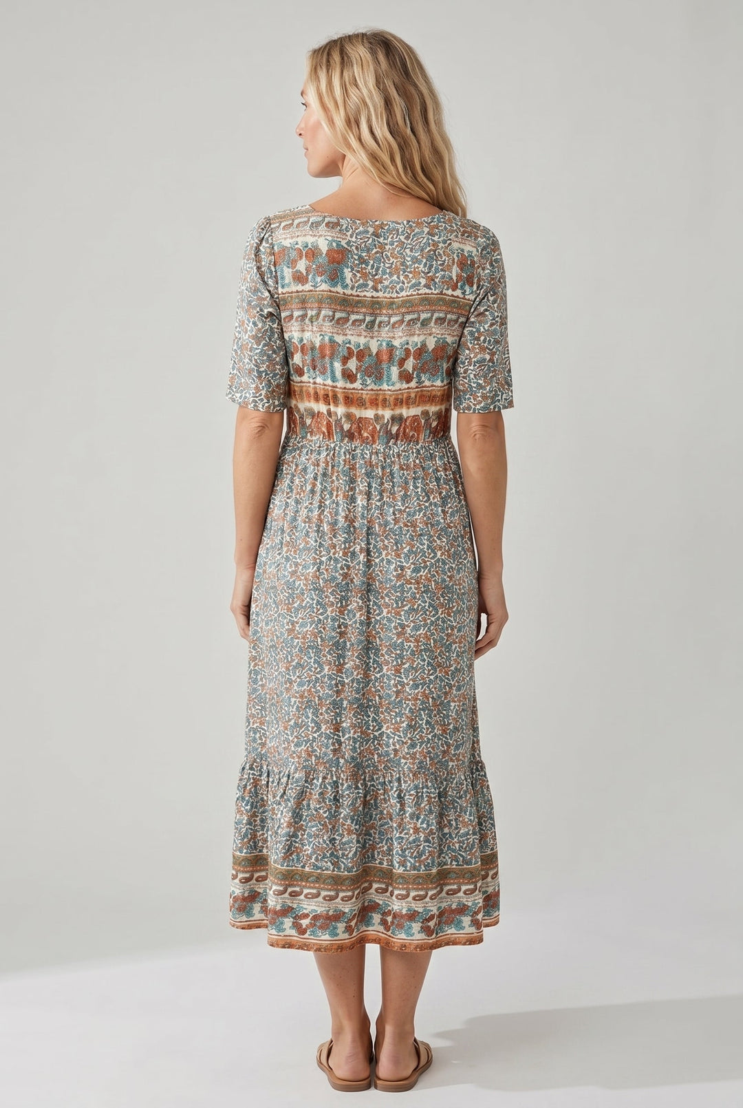 Summer festival boho midi dress, vibrant print, sleeveless, comfy shirred top.