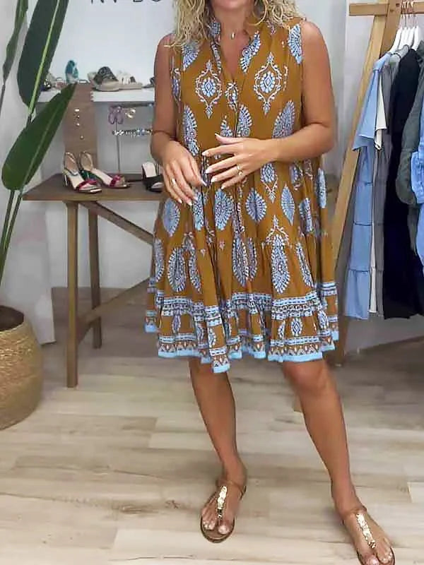Women's boho print mini dress with sleeveless V-neck and tiered hem. Perfect for summer casual wear.