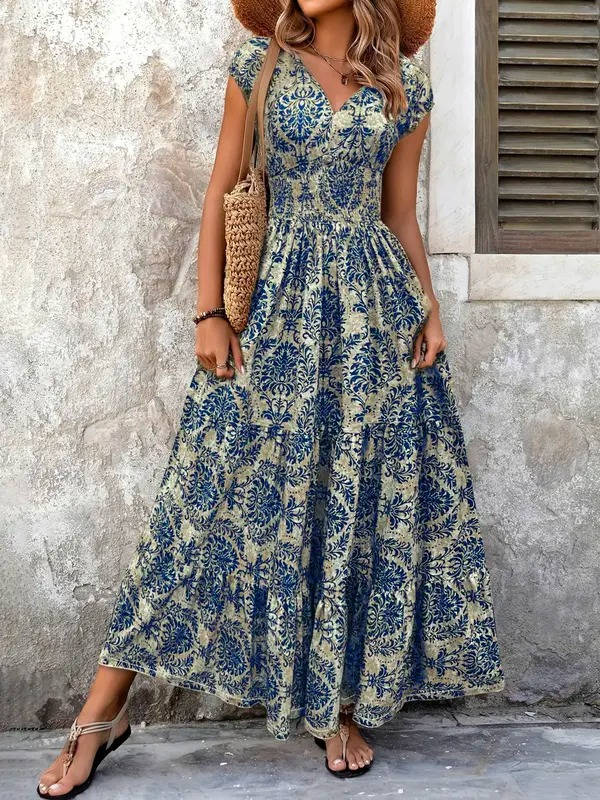 Women's elegant bohemian print maxi dress, smocked & tiered with V-neck cap sleeves.