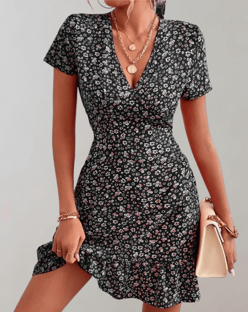 Flowing women's floral midi dress, a chic boho summer sleeveless dress for casual wear and vacation fashion.