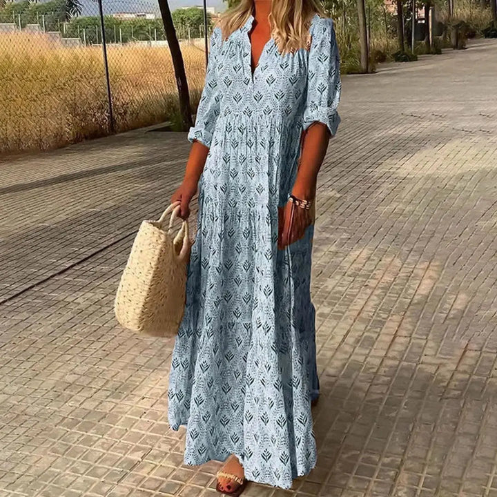 Bohemian women's maxi dress. Casual V-neck printed dress with roll-up sleeves for a comfortable summer style.