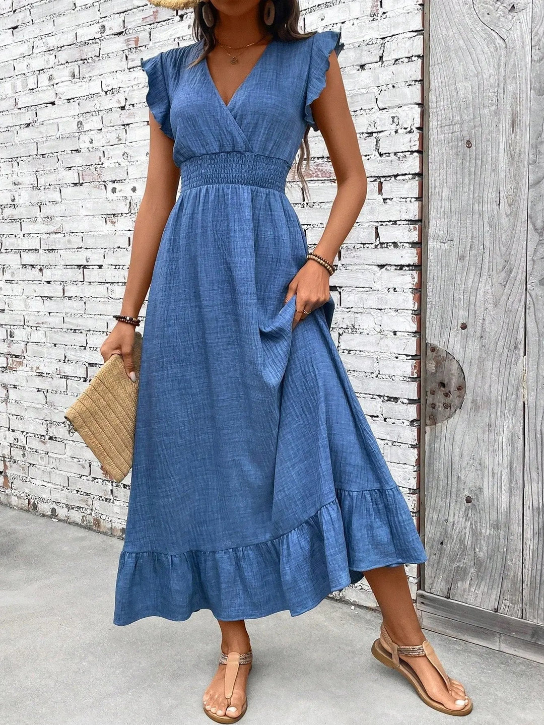 Women's Boho V-Neck Maxi Dress with smocked waist & ruffle hem, perfect for summer casual or vacation style.