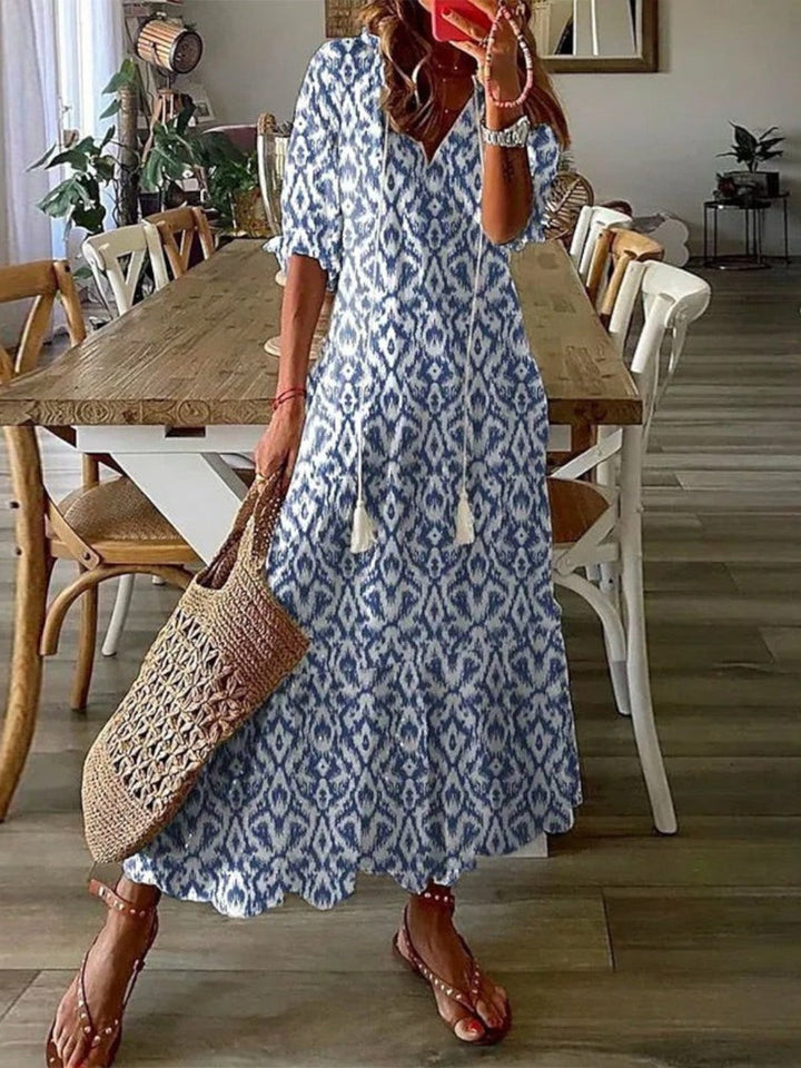 Women's boho V-neck summer dress, flowy & comfortable for effortless casual style.