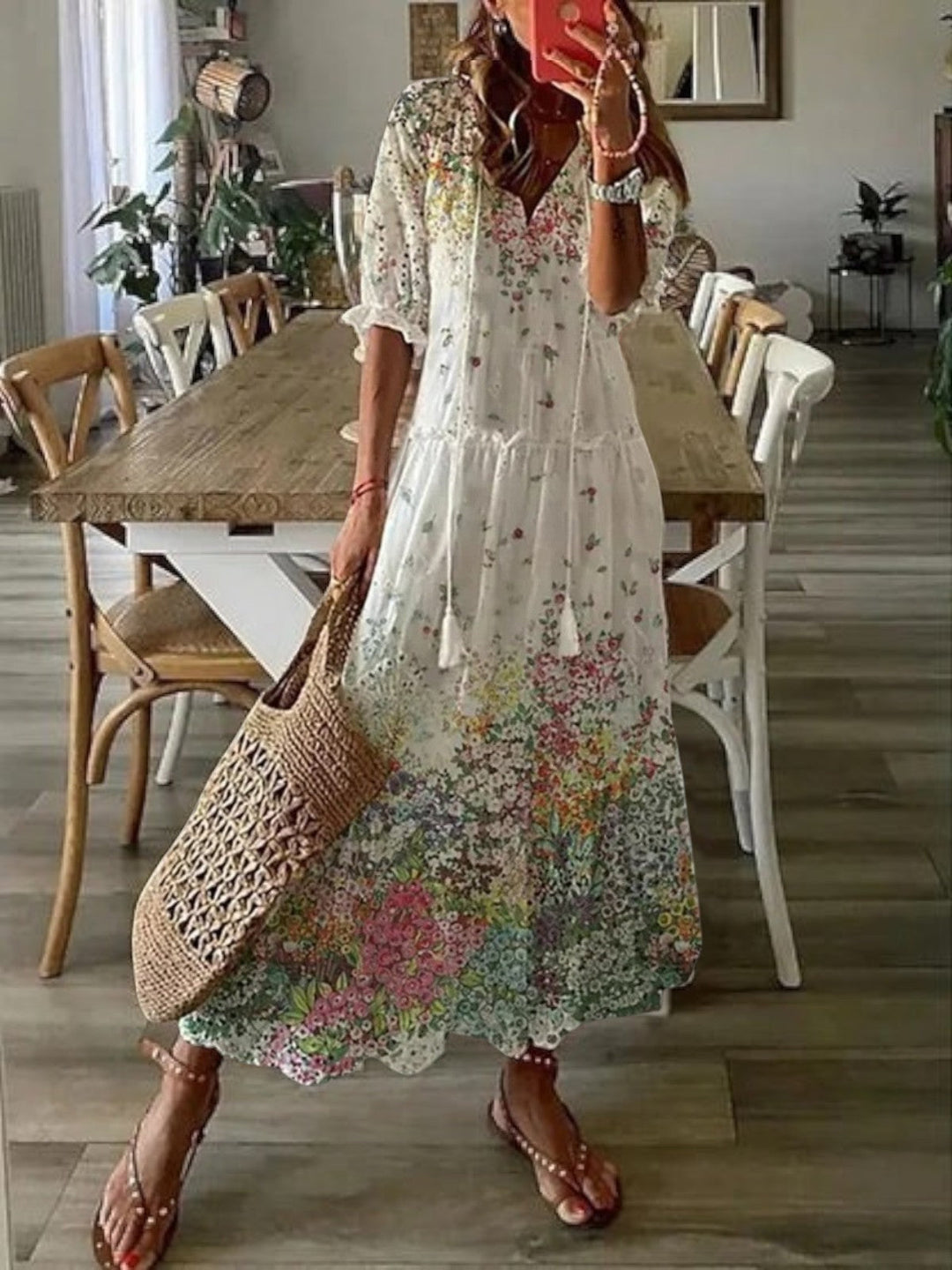 Flowy women's boho V-neck summer dress, a chic printed maxi for casual and beach outfits.