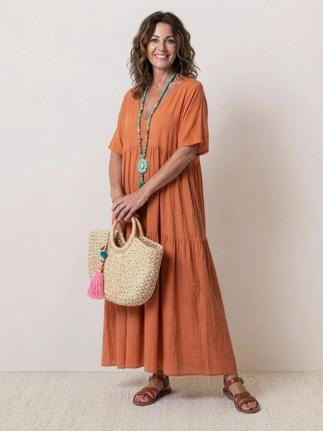 Women's Boho V-neck tiered maxi swing dress, perfect for summer comfort.