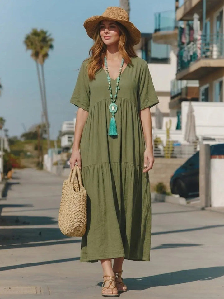 Elegant boho V-neck tiered maxi dress, women's resort wear, ultimate comfort.