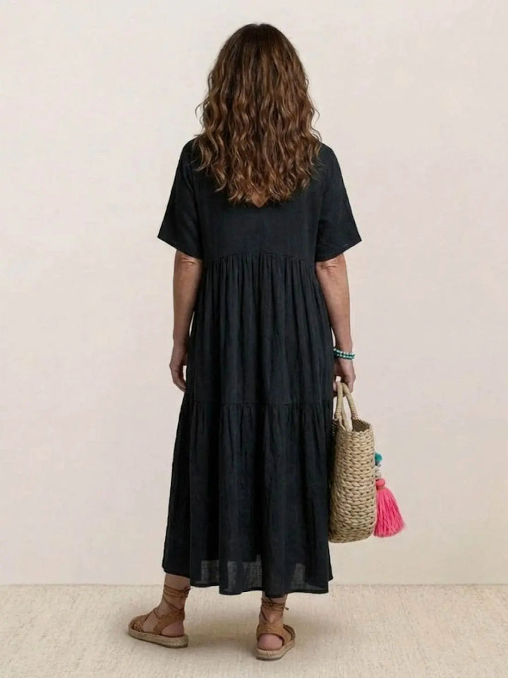Elegant women's tiered maxi dress, boho V-neck, swing style, summer comfort.