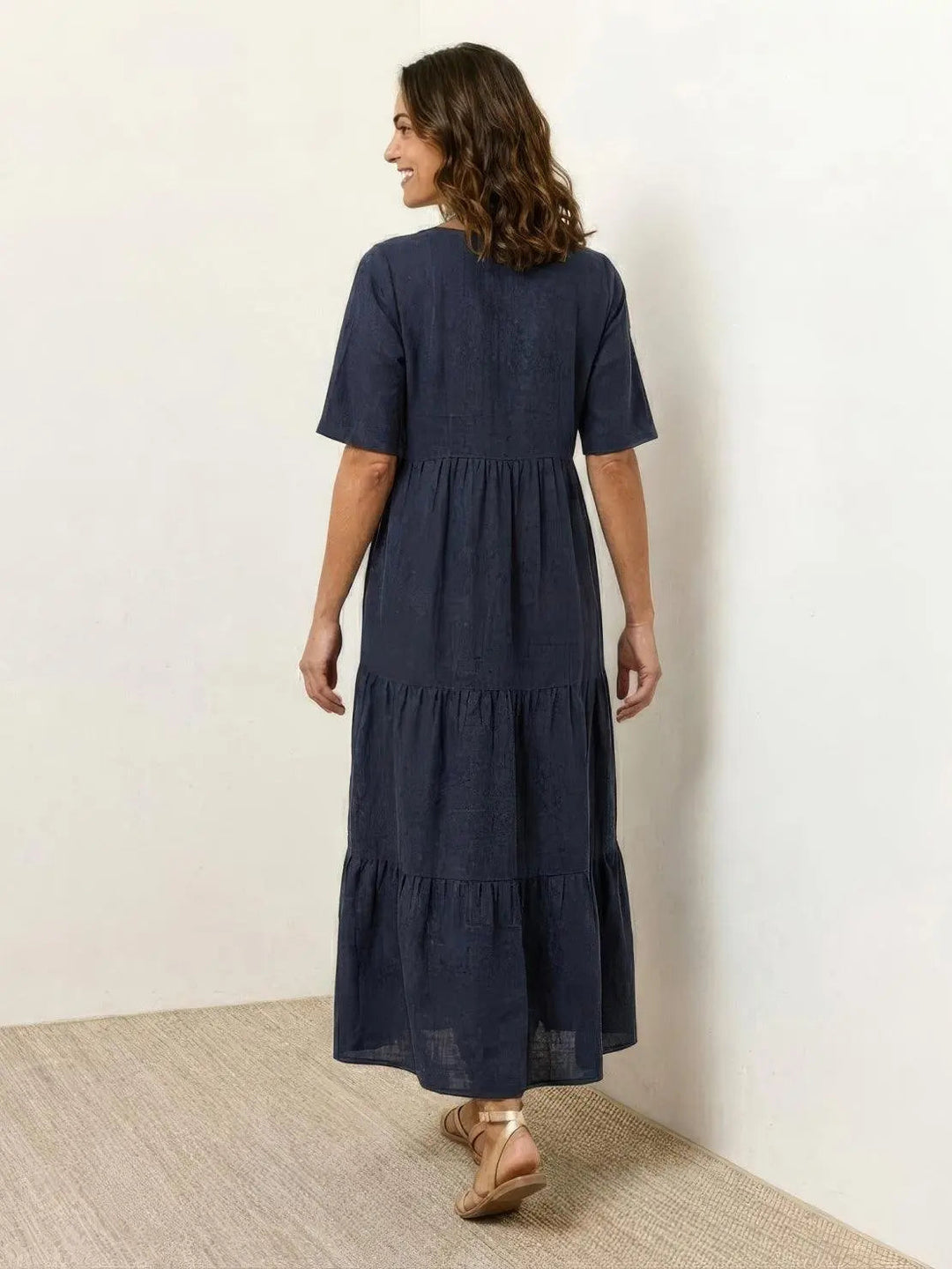 Comfortable women's boho tiered maxi dress, V-neck, flowy & perfect for summer.