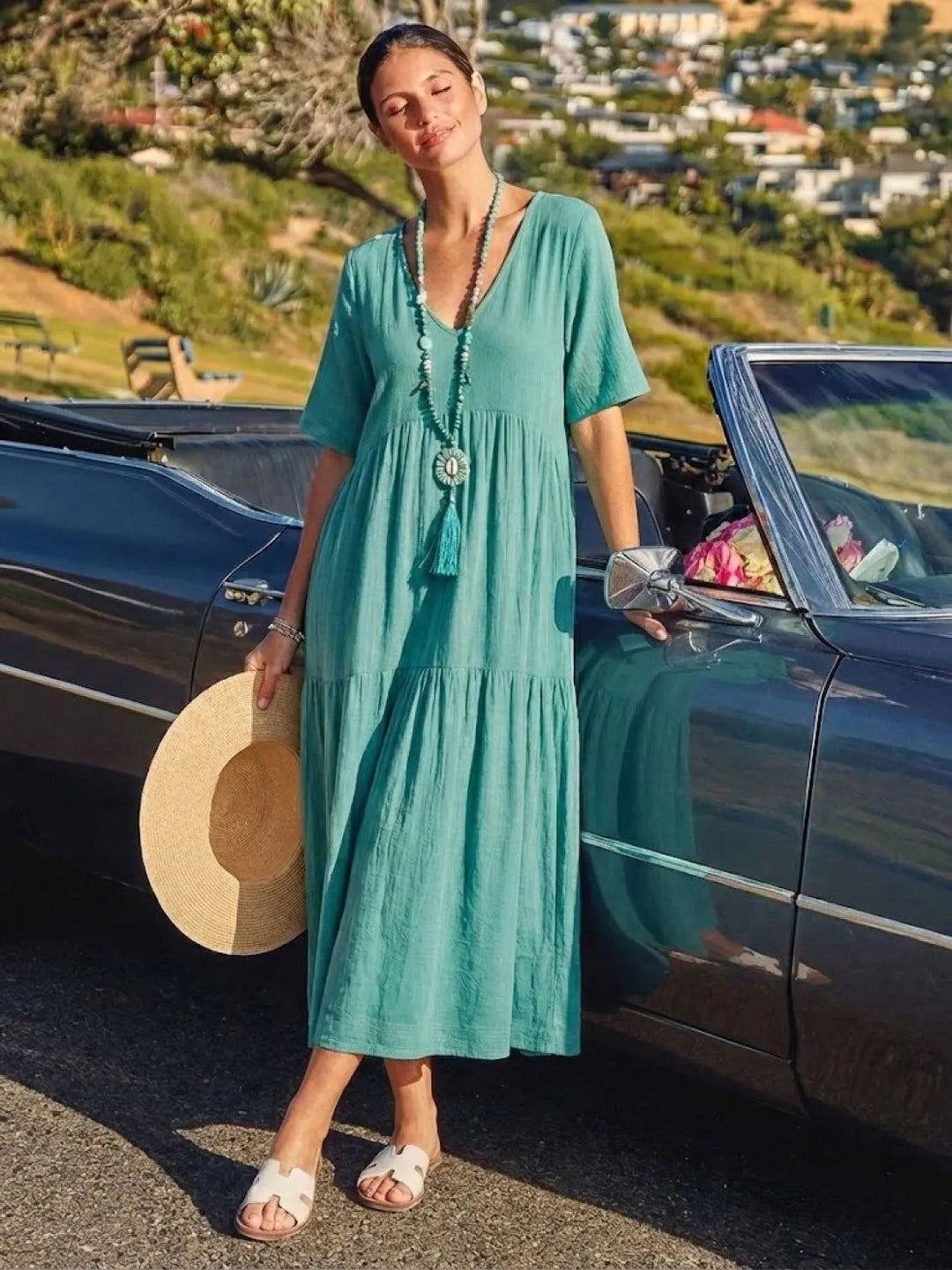 Casual women's V-neck tiered maxi dress, flowy boho style, summer comfort.