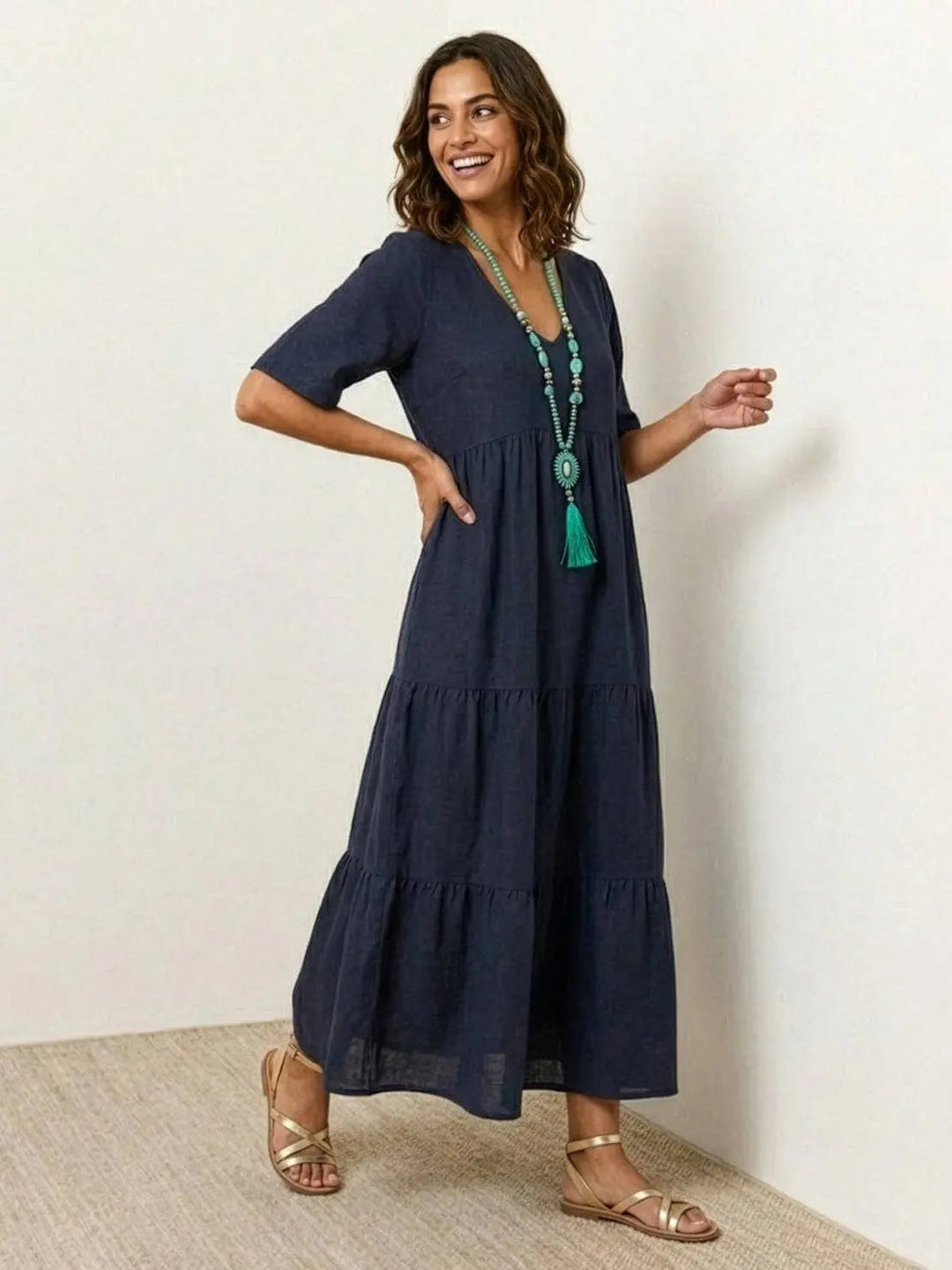 Loose fit women's casual boho V-neck tiered dress, ultimate summer comfort.