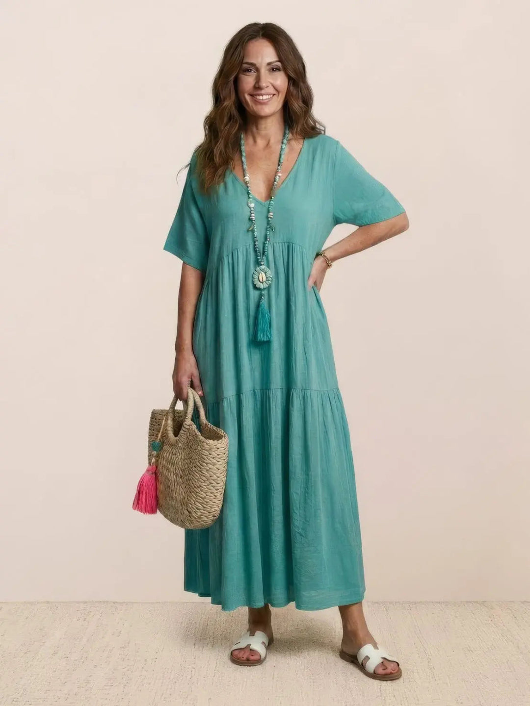 Boho maxi dress for women, V-neck tiered design, perfect for warm weather.