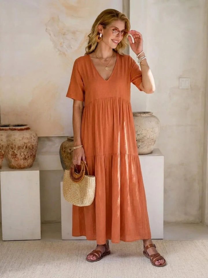 Chic V-neck tiered swing dress, women's boho fashion, casual & elegant.