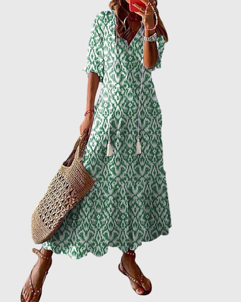 Elegant bohemian v-neck summer dress for women, perfect for vacation or breezy beach days.