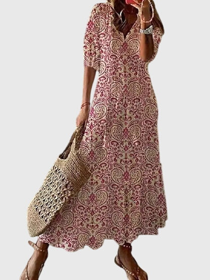 Chic vintage style women's summer dress, elegant bohemian maxi with a flattering v-neck.