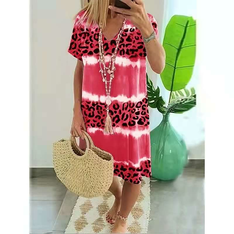 Relaxed fit women's v-neck shift dress with a bold, eye-catching print, great for easy-wear summer casual days.