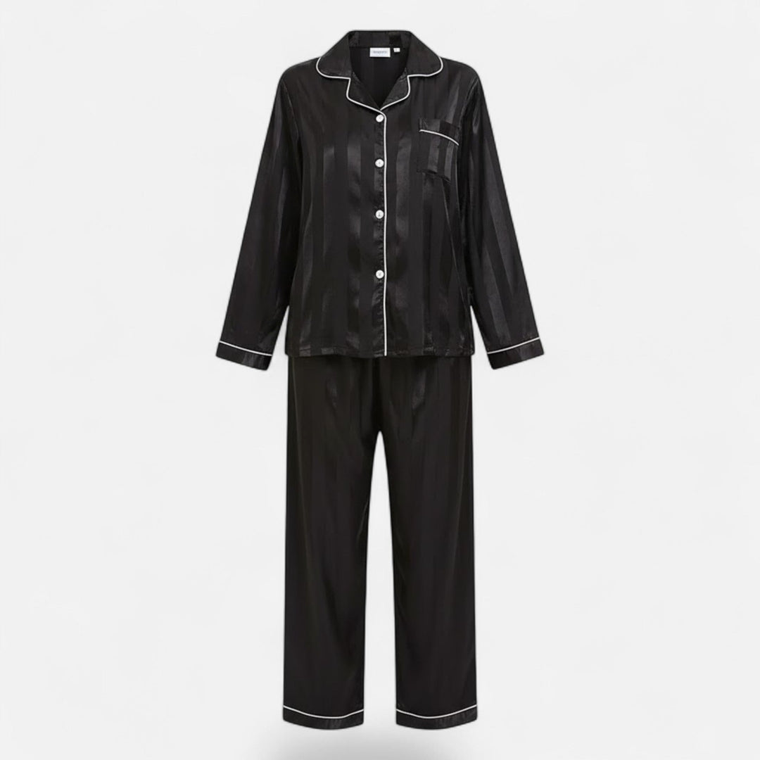 Women's bold stripe long sleeve lounge set. Comfortable two-piece loungewear for at-home fashion.