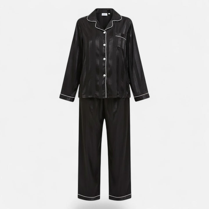 Women's bold stripe long sleeve lounge set. Comfortable two-piece loungewear for at-home fashion.