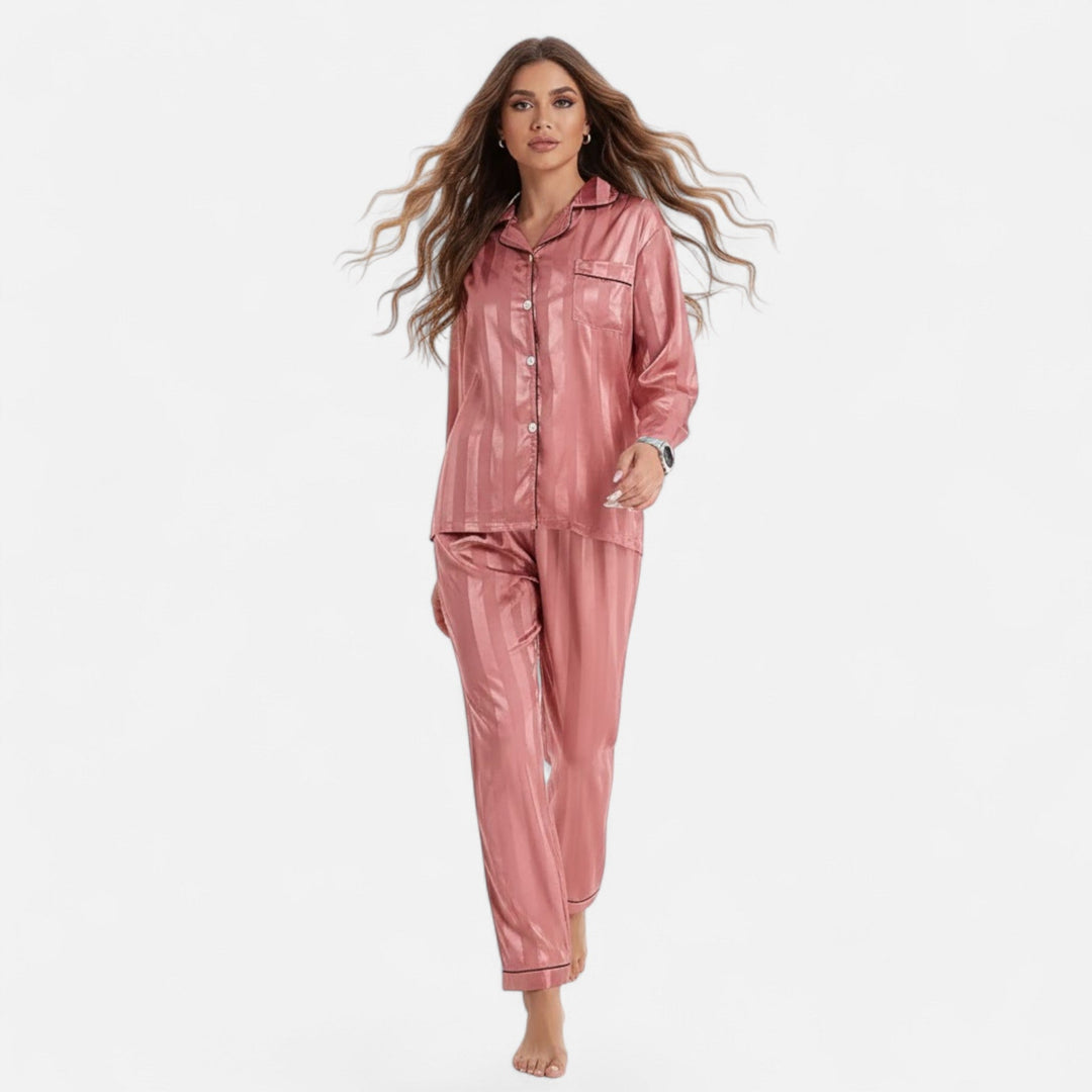 Women's long sleeve bold stripe lounge set, a comfortable and elegant two-piece for relaxed at-home fashion.