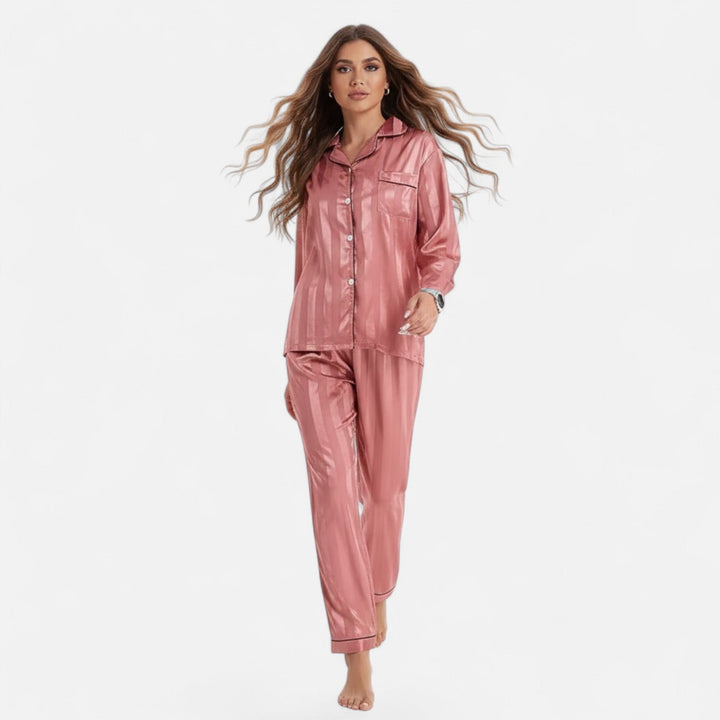 Women's long sleeve bold stripe lounge set, a comfortable and elegant two-piece for relaxed at-home fashion.