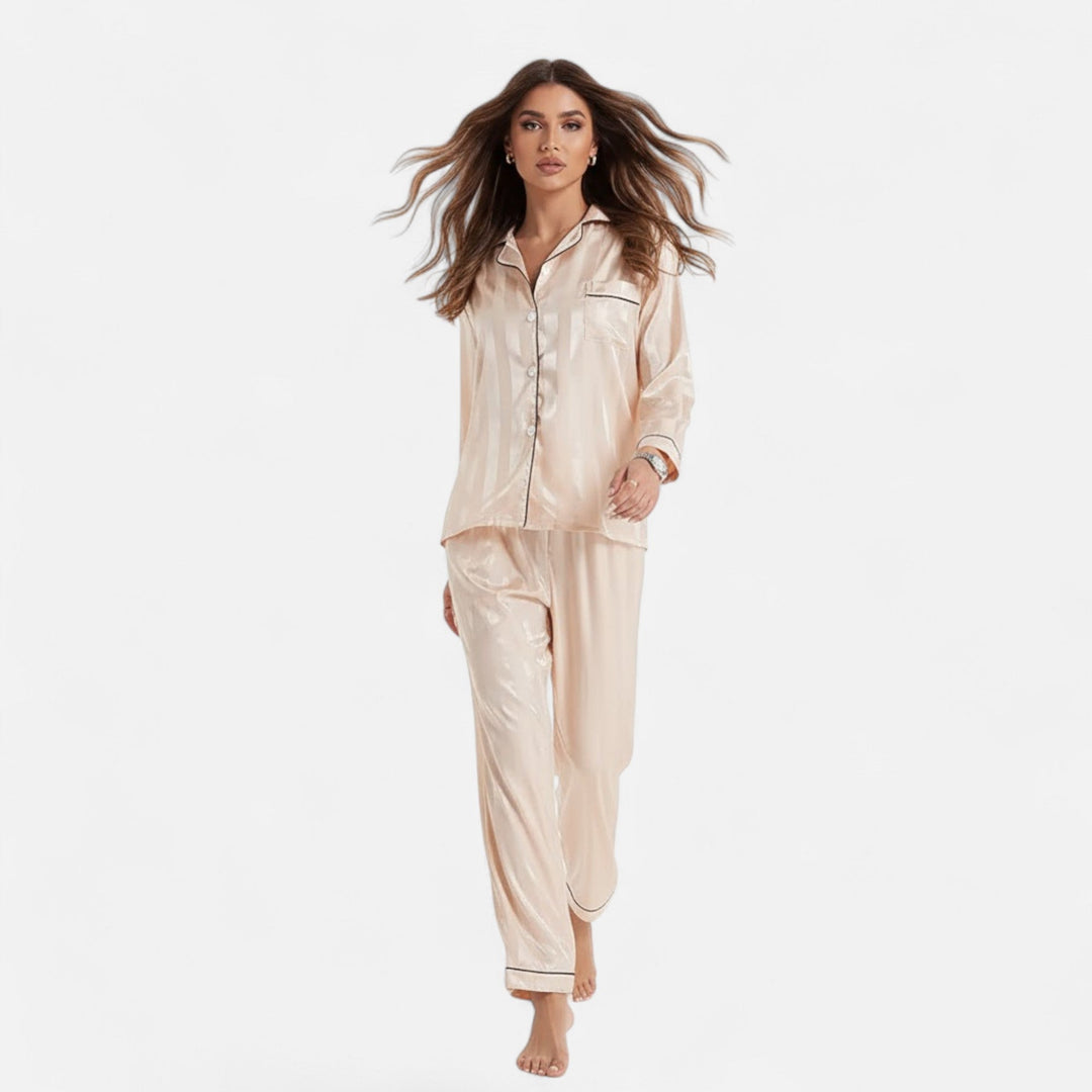 Women's elegant bold stripe long sleeve loungewear set. Perfect for stylish at-home comfort.