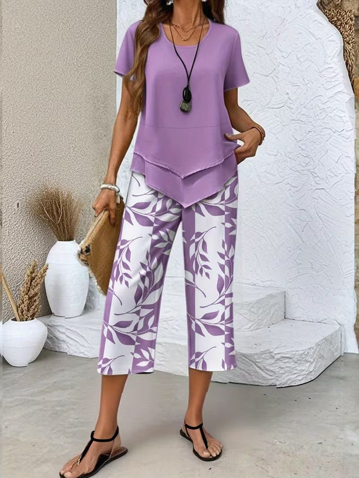 Vibrant botanical print lounge wear set for women. Perfect matching outfit for relaxed summer comfort.