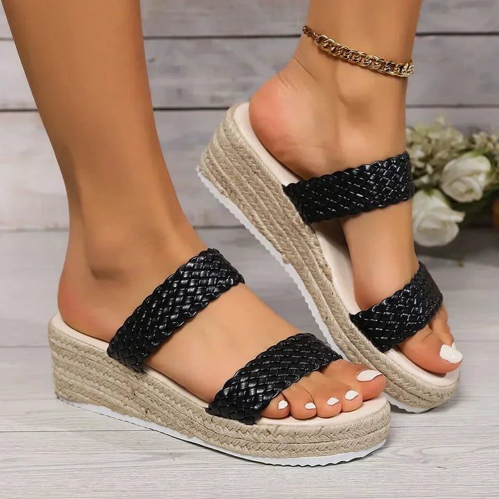 Versatile women's braided wedge sandals. Cushioned, slip-on comfort for casual wear, beach trips, or holidays.