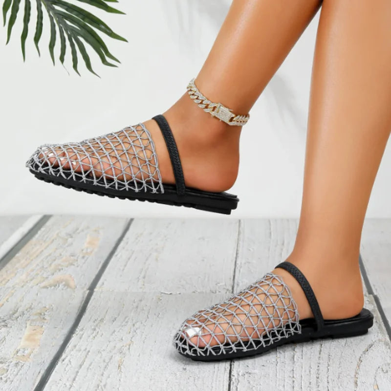 Vacation-ready women's flat sandals, breathable, closed-toe, and comfortable slingback design.