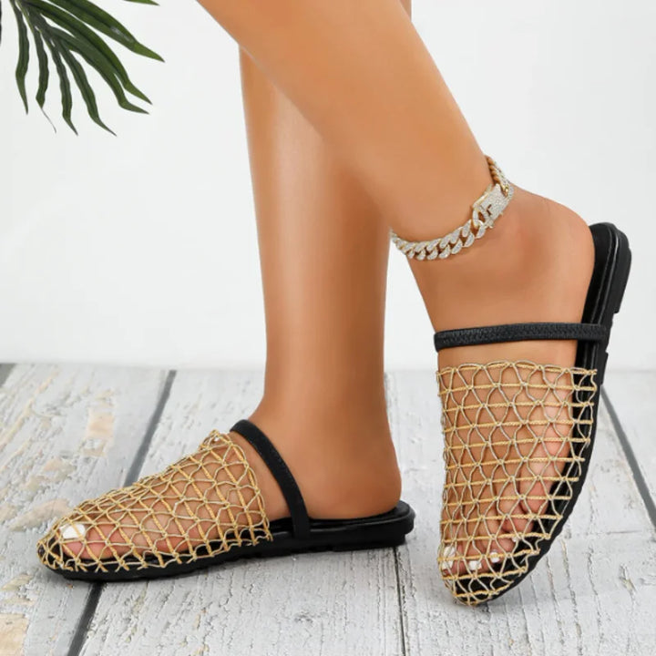 Women's breathable closed-toe flat sandals with slingback for summer comfort.
