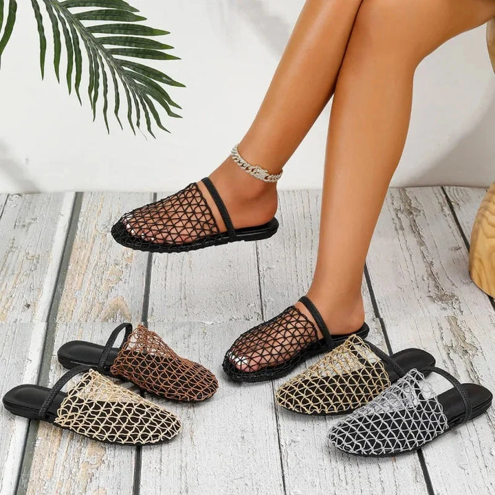 Woven closed-toe women's flat sandals, breathable and casual for beach or vacation.