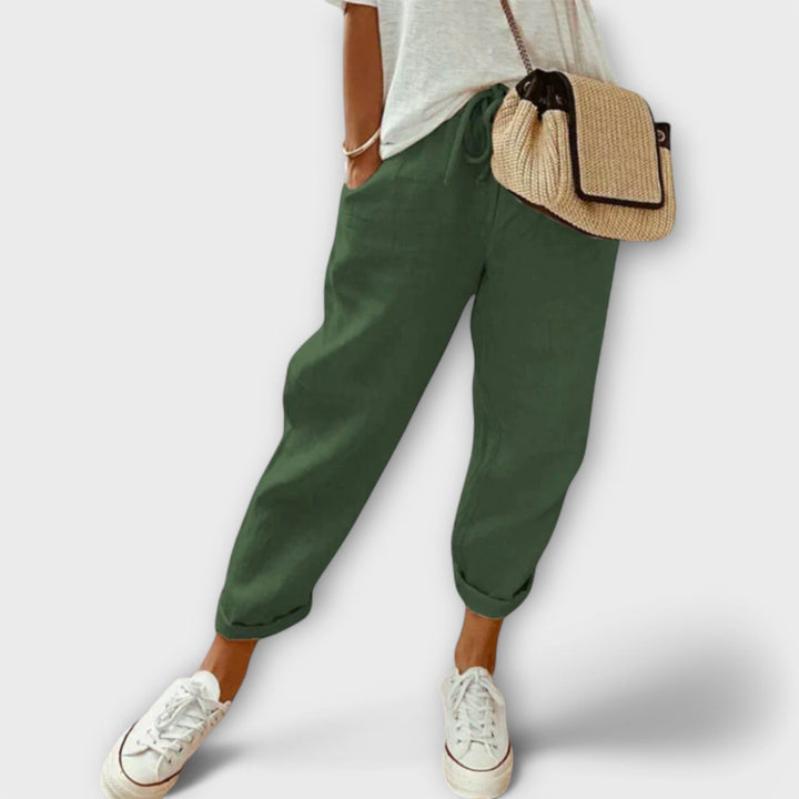 Women's wide-leg linen pants with a relaxed fit, great for casual summer fashion.