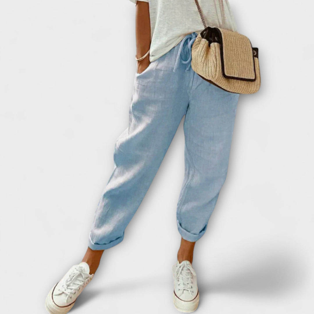 Effortless women's linen trousers, versatile & breathable for comfortable everyday style.