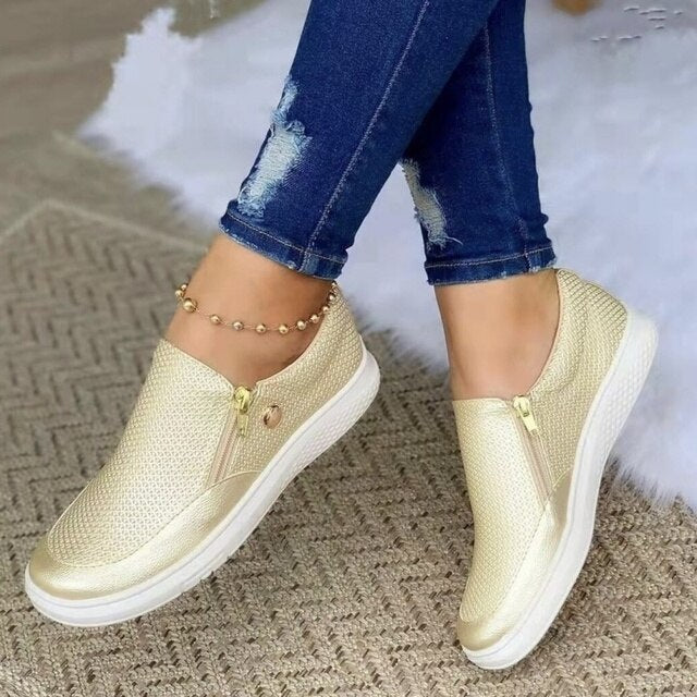Stylish women's platform slip-on sneakers, breathable design & side zip for comfortable, trendy casual footwear.