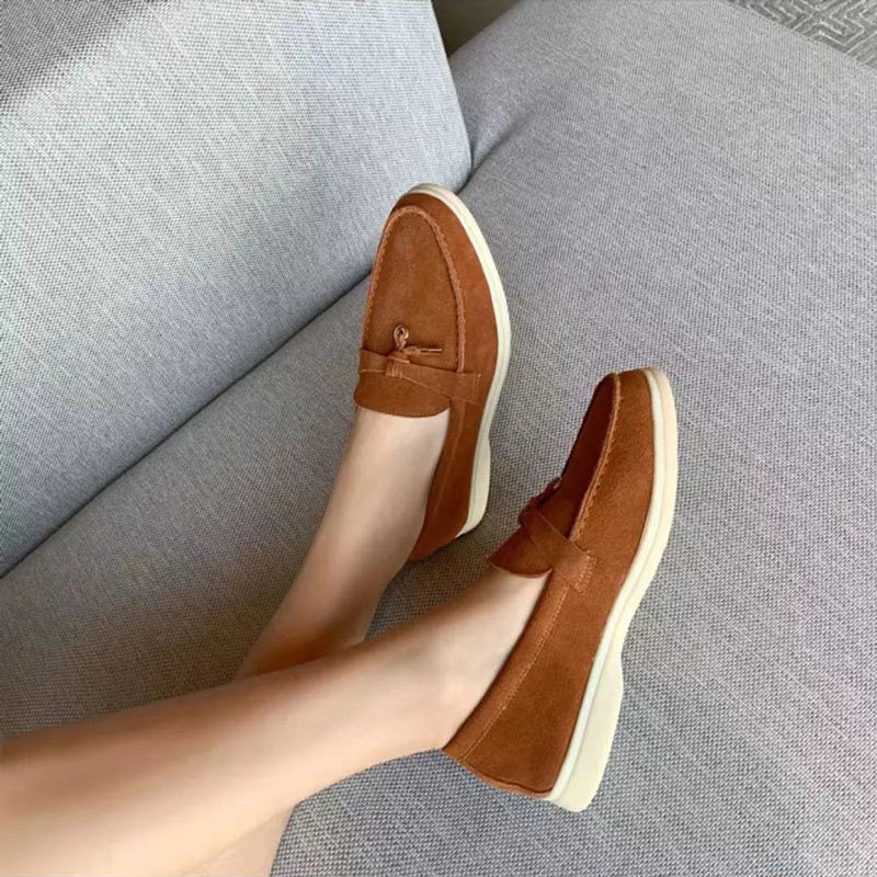 Pair of women's breathable pointed toe loafers. Elegant, comfortable slip-on flats for spring, summer & everyday fashion.