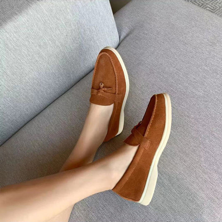 Pair of women's breathable pointed toe loafers. Elegant, comfortable slip-on flats for spring, summer & everyday fashion.