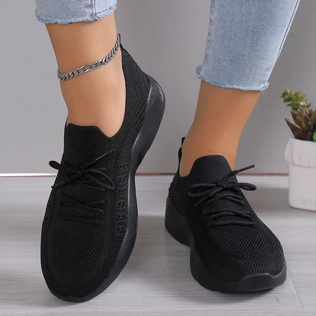 Stylish black women's casual footwear, perfect for athleisure looks.