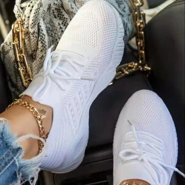 Active lifestyle shot of women wearing lightweight, breathable sneakers.