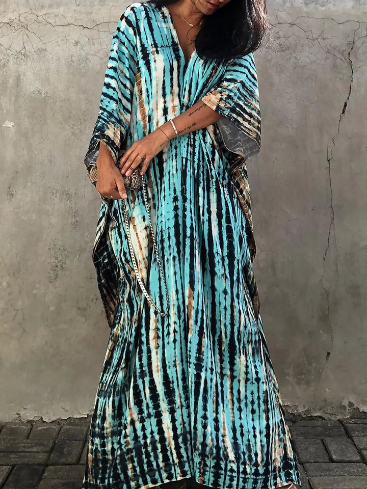 Elegant women's resort wear maxi dress, a patterned caftan for vacation style.