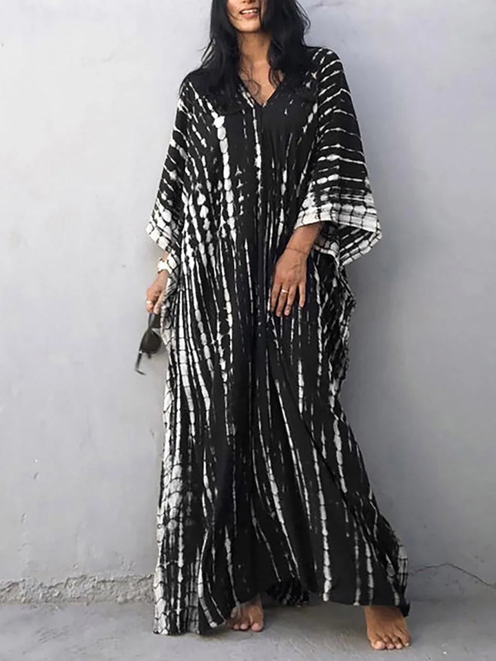 Effortless beachwear caftan dress, a flowing maxi for comfortable women's summer fashion.