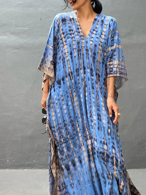 Patterned caftan maxi dress, ideal women's beachwear & resort wear for vacation chic.