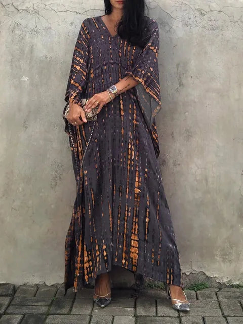 Vacation style caftan maxi dress, offering a comfortable & flowing silhouette for women.