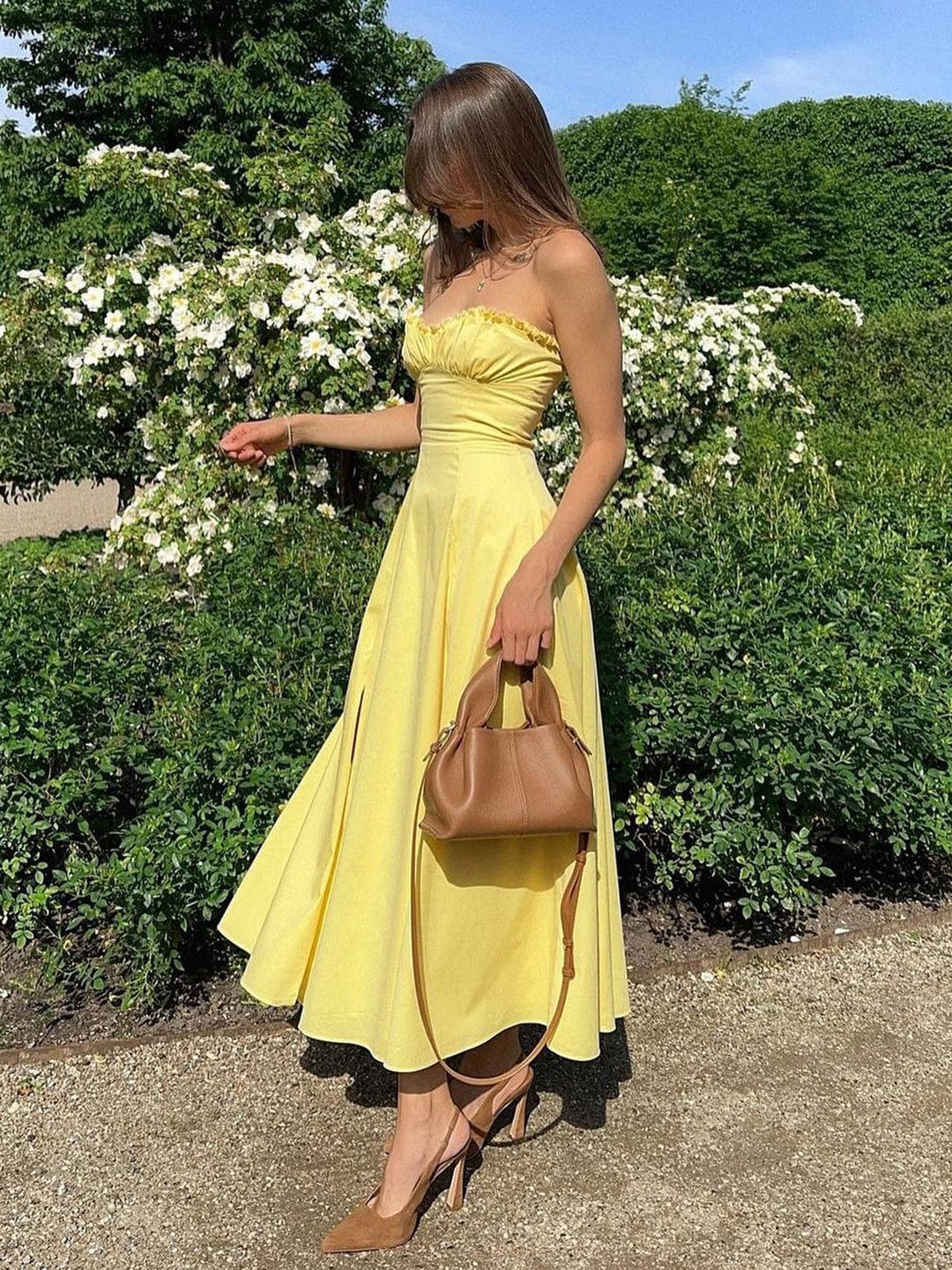 Women's breezy maxi dress with a sweetheart neckline, perfect for summer vacations and elegant wear.